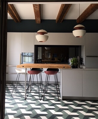 hexagon cement tile on the floor in a kitchen by Cement Tiles Co in Liverpool